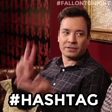 gif of Jimmy Fallon making hashtags sign with hands